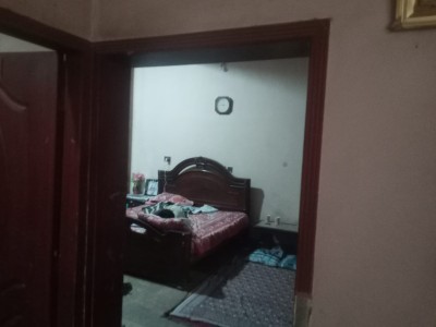 7 Marla Corner House Fully Marble with 3 Shops on SALE.