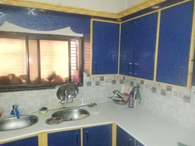 7 Marla Corner House Fully Marble with 3 Shops on SALE.